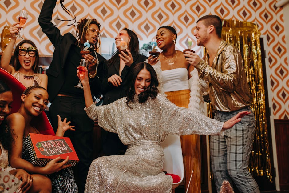 Group of friends celebrating a festive holiday party with joy and style indoors.